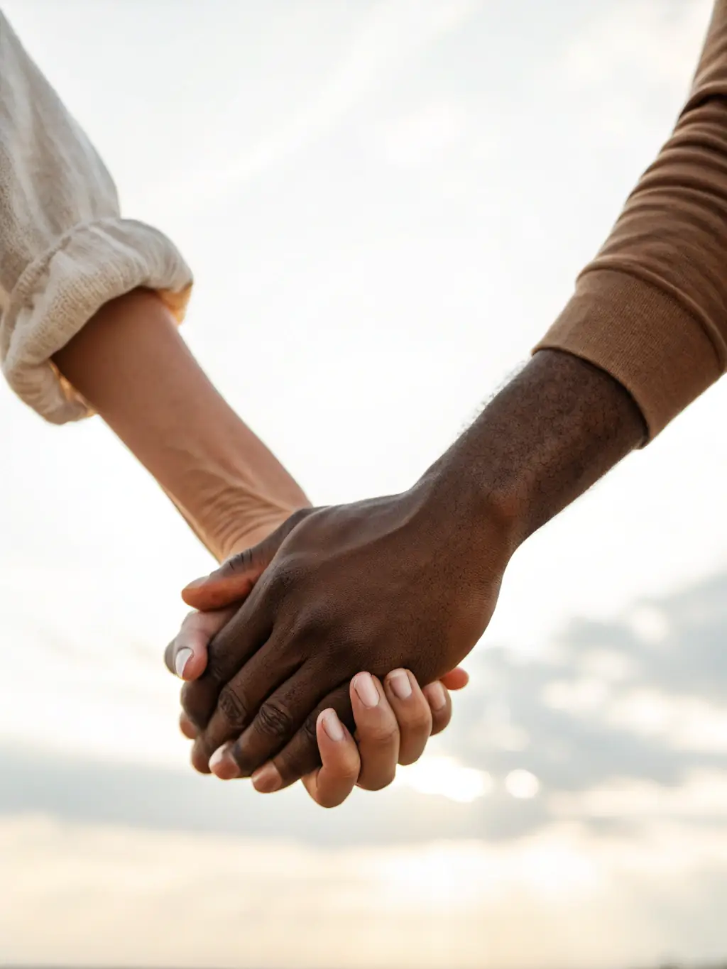 A supportive hand reaching out to another person, symbolizing help and resources for problem gambling. The background is a blurred image of a support group.